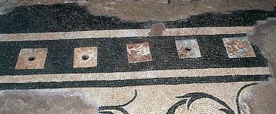 Holes for the libations on the mosaic floor of Mausoleum F, Vatican Necropolis. Photo: www.vatican.va